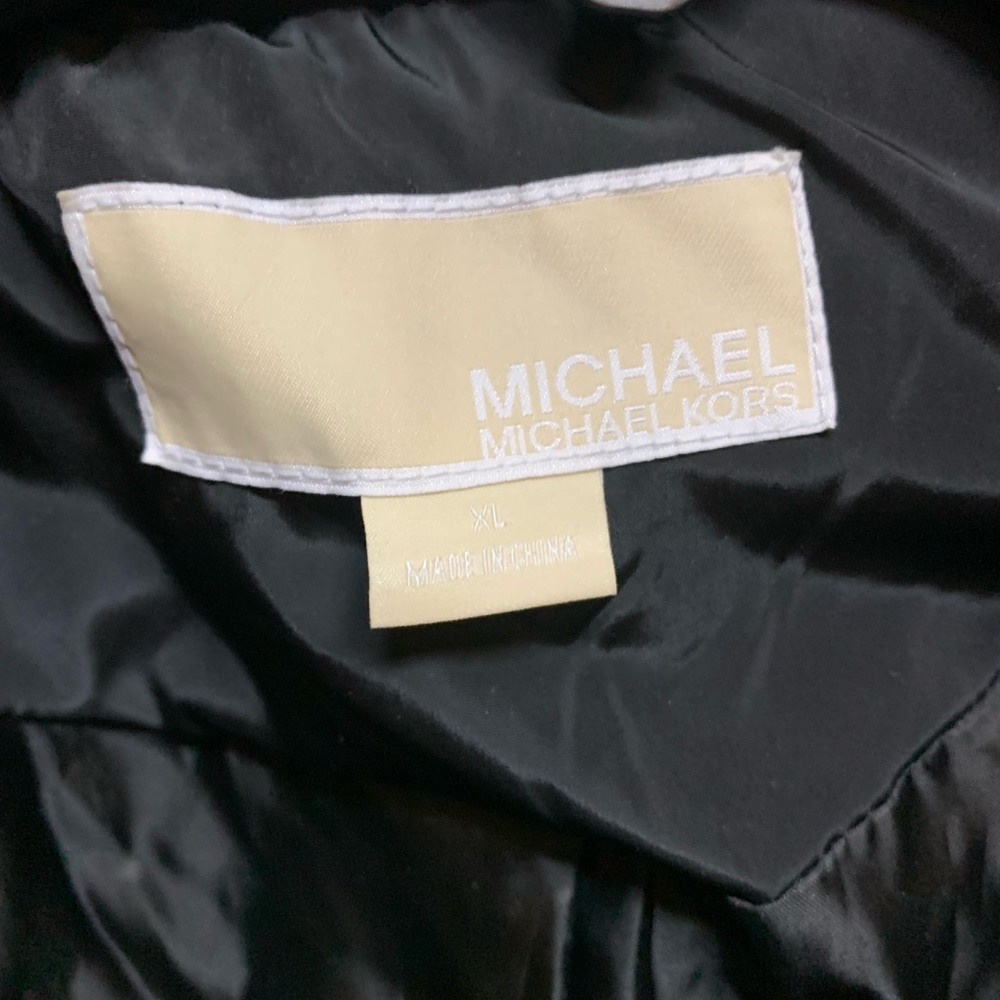 New mk bubble jacket black color Xl
